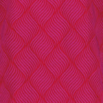 lähikuva pinkistä jacquard-kankaasta jossa on kuviointi pinkillä, oranssilla pohjalla