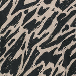 lähikuva kuosista jossa graafinen musta beige sophy-kuosi